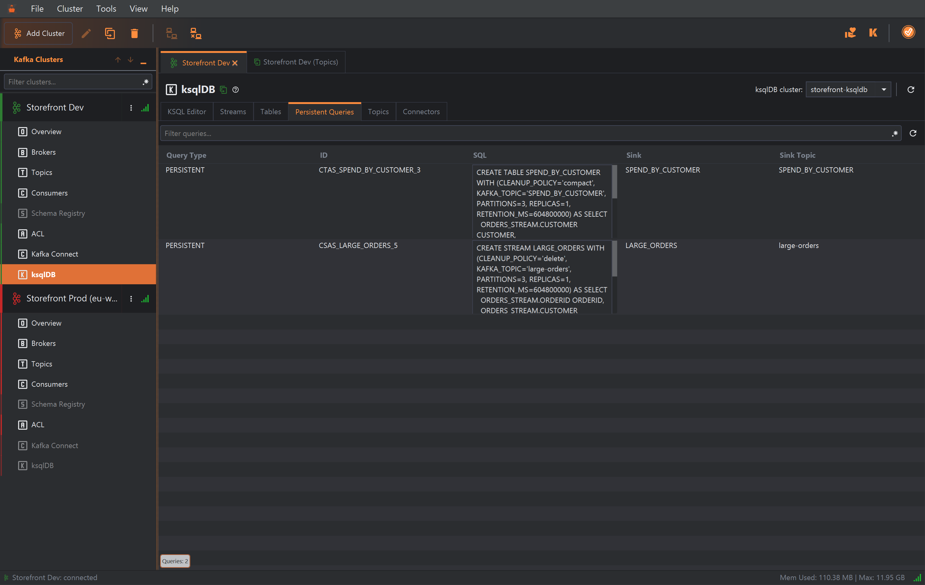 The Persistent Queries tab listing two queries with Query Type, ID, SQL, Sink and Sink Topic: PERSISTENT, CTAS_SPEND_BY_CUSTOMER_3, CREATE TABLE SPEND_BY_CUSTOMER WITH (CLEANUP_POLICY='compact', KAFKA_TOPIC='SPEND_BY_CUSTOMER', ...) AS SELECT ..., sink SPEND_BY_CUSTOMER, sink topic SPEND_BY_CUSTOMER; and PERSISTENT, CSAS_LARGE_ORDERS_5, CREATE STREAM LARGE_ORDERS WITH (CLEANUP_POLICY='delete', KAFKA_TOPIC='large-orders', ...) AS SELECT ..., sink LARGE_ORDERS, sink topic large-orders.