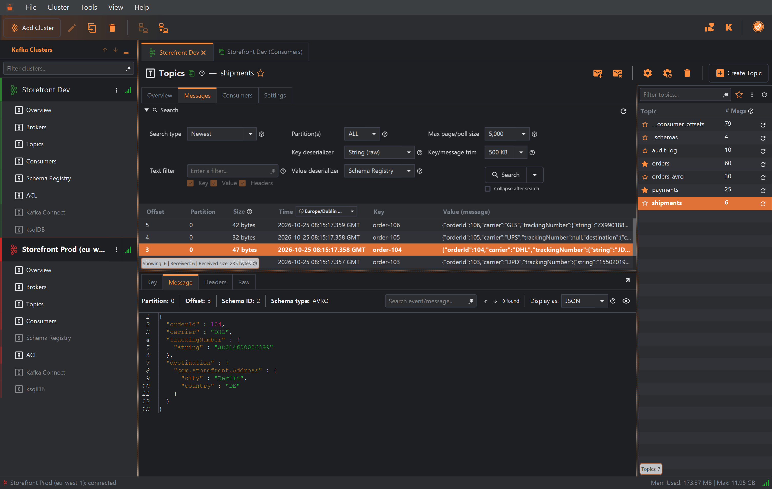 The Message tab for offset 3 of the shipments topic: Schema ID 2, Schema type AVRO, Display as JSON. The value reads orderId 104, carrier DHL, trackingNumber as an object with the single field string set to JD014600006399, and destination as an object with the single field com.storefront.Address holding city Berlin and country DE.