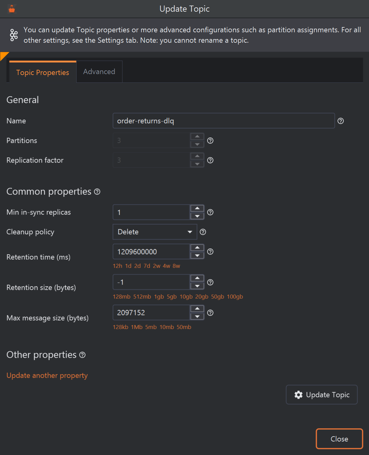The Update Topic dialog for order-returns-dlq on its Topic Properties tab. The name is filled in; Partitions 3 and Replication factor 3 are greyed out. Common properties show Min in-sync replicas 1, Cleanup policy Delete, Retention time 1209600000 ms, Retention size -1 and Max message size 2097152 bytes. Below are Other properties with an Update another property link, the Update Topic button, and Close.